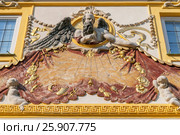 Baroque solar clock on the wall of Wilanow castle, Royal Palace, Warsaw Poland. Стоковое фото, агентство BE&W Photo / Фотобанк Лори