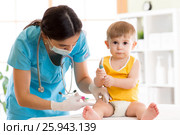 Doctor does injection child vaccination baby. Стоковое фото, фотограф Оксана Кузьмина / Фотобанк Лори