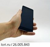 Black smartphone in hand. Стоковое фото, фотограф Дмитрий Родин / Фотобанк Лори