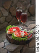 Bruschetta appetizer with red wine on wooden table. Стоковое фото, фотограф Марина Володько / Фотобанк Лори