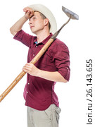 portrait of a tired haggard farmer with a hoe on a white background. Стоковое фото, фотограф Константин Лабунский / Фотобанк Лори
