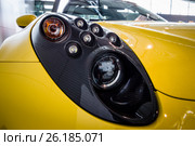 STUTTGART, GERMANY - MARCH 03, 2017: Headline of the sports car Alfa Romeo 4C Spider (Type 960), 2015. Close-up. Europe's greatest classic car exhibition "RETRO CLASSICS" Редакционное фото, фотограф Sergey Kohl / Фотобанк Лори