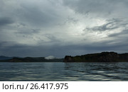 Storm clouds over coast of Kamchatka in Avacha Bay. Стоковое фото, фотограф Юлия Машкова / Фотобанк Лори