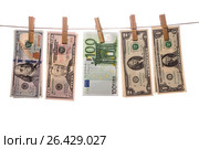 Dollar bills on clothespins on white background. Стоковое фото, фотограф Валерий Бочкарев / Фотобанк Лори
