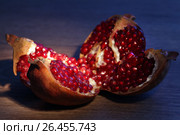 Fruit pomegranate in night light. Стоковое фото, фотограф ElenArt / Фотобанк Лори