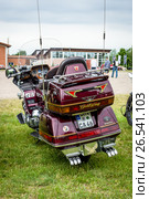 PAAREN IM GLIEN, GERMANY - JUNE 03, 2017: A touring motorcycle Honda Gold Wing GL1500. Rear view. Exhibition "Die Oldtimer Show". Редакционное фото, фотограф Sergey Kohl / Фотобанк Лори