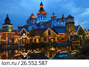 SOCHI, RUSSIA - June 18, 2017: Mystery night view of Sochi Park, which entered the TOP-25 of the best parks in Europe in 2016. Редакционное фото, фотограф Анна Мартынова / Фотобанк Лори