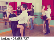 men and women enjoying of tango in class. Стоковое фото, фотограф Яков Филимонов / Фотобанк Лори