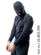 Grieved criminal in handcuffs arrested, portrait on white background. Стоковое фото, фотограф Константин Лабунский / Фотобанк Лори