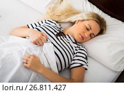Girl sleeping with striped pygamas. Стоковое фото, фотограф Яков Филимонов / Фотобанк Лори