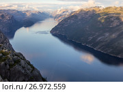 Preikestolen or Prekestolen or Preacher's Pulpit or Pulpit Rock, is a famous tourist attraction in Forsand, Ryfylke, Norway (2017 год). Стоковое фото, фотограф Алексей Ширманов / Фотобанк Лори