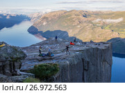 Preikestolen or Prekestolen or Preacher's Pulpit or Pulpit Rock, is a famous tourist attraction in Forsand, Ryfylke, Norway (2017 год). Редакционное фото, фотограф Алексей Ширманов / Фотобанк Лори