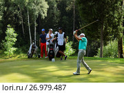 Golfers on the course (2014 год). Редакционное фото, фотограф Stockphoto / Фотобанк Лори