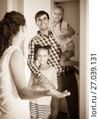 Hospitable householder meeting expected guests. Стоковое фото, фотограф Яков Филимонов / Фотобанк Лори