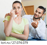 Young man talking to upset woman. Стоковое фото, фотограф Яков Филимонов / Фотобанк Лори