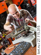 worker making nameboard. Стоковое фото, фотограф Яков Филимонов / Фотобанк Лори