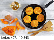 pumpkin pancakes on skillet, top view. Стоковое фото, фотограф Oksana Zh / Фотобанк Лори