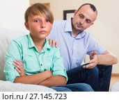 Offended man and stubborn teenager. Стоковое фото, фотограф Яков Филимонов / Фотобанк Лори