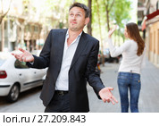 Disappointed man in quarrel with girlfriend. Стоковое фото, фотограф Яков Филимонов / Фотобанк Лори