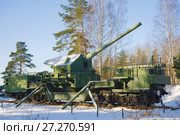 180-мм артиллерийская установка ТМ-1-180 в боевом положении крупным планом февральским солнечным днем. Форт "Красная Горка" (Алексеевский). Ленинградская область (2017 год). Редакционное фото, фотограф Виктор Карасев / Фотобанк Лори