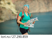 Girl tourist with a backpack on the background of mountains. Стоковое фото, фотограф Наталья Давыдова / Фотобанк Лори