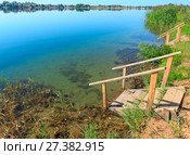 Summer lake calm beach with wood steeps to the water. Стоковое фото, фотограф Юрий Брыкайло / Фотобанк Лори