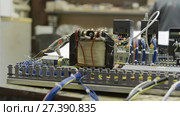 Electrical modules, switches, relays and cables are mounted on the circuit board. Стоковое видео, видеограф Андрей Радченко / Фотобанк Лори