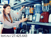 Young woman choosing blender in household appliances shop. Стоковое фото, фотограф Яков Филимонов / Фотобанк Лори