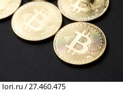 Bitcoin gold coin and chart background. Стоковое фото, фотограф Иван Карпов / Фотобанк Лори