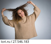 Young woman with curly hair. Стоковое фото, фотограф Типляшина Евгения / Фотобанк Лори