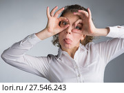 Young business woman on gray background. Стоковое фото, фотограф Типляшина Евгения / Фотобанк Лори
