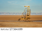 A funny metallic chair at the large salt lake Chott El Jerid, Sahara. Стоковое фото, фотограф Сергей Цепек / Фотобанк Лори