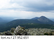 View from the top of one of the mountains of the South Urals in the Taganay natural park in cloudy weather. Стоковое фото, фотограф Евгений Харитонов / Фотобанк Лори
