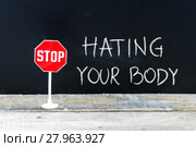 STOP HATING YOUR BODY message written on chalkboard. Стоковое фото, фотограф Constantin Stanciu / PantherMedia / Фотобанк Лори