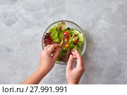 woman prepares vegetable salad. Стоковое фото, фотограф Ярослав Данильченко / Фотобанк Лори
