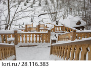 Wooden stairs with carving in Russian Orthodox Monastery at winter day. Стоковое фото, фотограф Losevsky Pavel / Фотобанк Лори