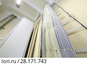 Empty storage at communications room with many cables and ladder. Стоковое фото, фотограф Losevsky Pavel / Фотобанк Лори
