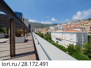 Place to relax on flat roof of one of modern buildings of Monte Carlo and views of surroundings of Monaco (2016 год). Стоковое фото, фотограф Losevsky Pavel / Фотобанк Лори
