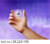Icon of etereum on a transparent digital screen on the ultraviolet background of the city. Стоковое фото, фотограф Ярослав Данильченко / Фотобанк Лори