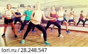 Happy adults having group fitness class. Стоковое фото, фотограф Яков Филимонов / Фотобанк Лори