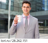 Businessman drinking coffee. Стоковое фото, фотограф Яков Филимонов / Фотобанк Лори