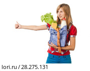 Девушка с пакетом продуктов делает жест, останавливающий проезжающий мимо автомобиль. Стоковое фото, фотограф Давид Мзареулян / Фотобанк Лори