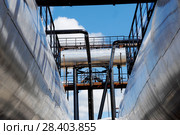 Россия,Тюменская область, Уватский район, Кальчинское месторождение нефти. Трубопроводы, ёмкости. Стоковое фото, фотограф Александр Циликин / Фотобанк Лори