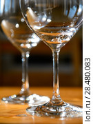 Close up picture of empty wine glasses at home. Стоковое фото, фотограф Kirill Kedrinskiy / Ingram Publishing / Фотобанк Лори