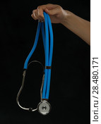 Close-up of female doctor holding stethoscope , focus on stethoscope. Стоковое фото, фотограф Kirill Kedrinskiy / Ingram Publishing / Фотобанк Лори