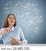 Smart business woman thinking. Sketches with her toughts overhead. Стоковое фото, фотограф Kirill Kedrinskiy / Ingram Publishing / Фотобанк Лори