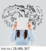 Young business woman thinking of her fearsand doubts closeup face portrait and sketches overhead. Стоковое фото, фотограф Kirill Kedrinskiy / Ingram Publishing / Фотобанк Лори