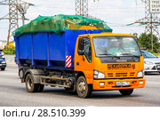 Isuzu NQR (2012 год). Редакционное фото, фотограф Art Konovalov / Фотобанк Лори