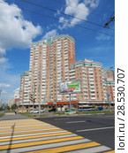 Город Москва. Двадцатитрехэтажный девятиподъездный монолитный жилой дом (построен в 2014 году по индивидуальному проекту). Мичуринский проспект, 26. Район Раменки (2018 год). Редакционное фото, фотограф lana1501 / Фотобанк Лори