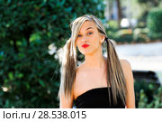 Beautiful and fashion girl with pigtails. Стоковое фото, фотограф Javier Sánchez Mingorance / Ingram Publishing / Фотобанк Лори